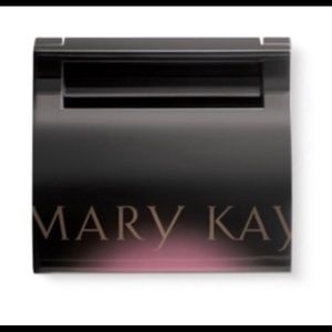 Mary Kay compact.